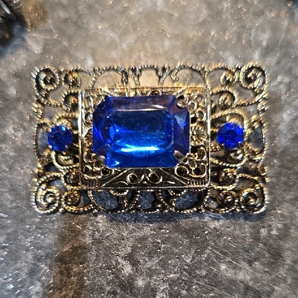 Elegant Blue and Gold Brooch